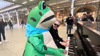 Strange Frog Man Turns Up At The Public Piano