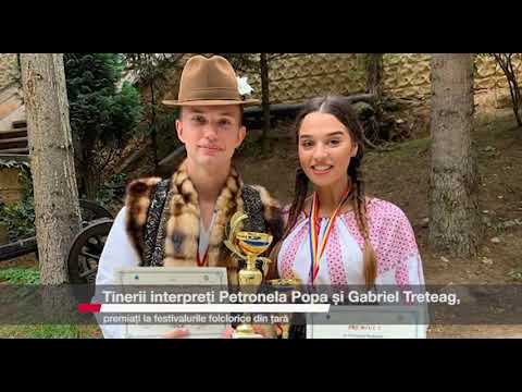 TINERII INTERPRETI PETRONELA POPA SI GABRIEL TRETEAG PREMIATI LA FESTIVALURILE FOLCLORICE DIN TARA