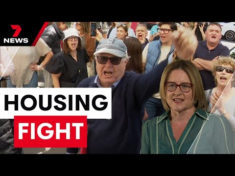 Furious locals target the premier over her plan to build housing towers in 50 neighbourhoods | 7NEWS