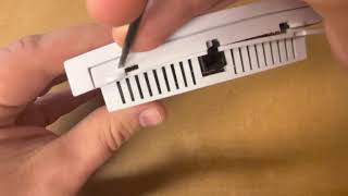 How to open Carrier Thermostat