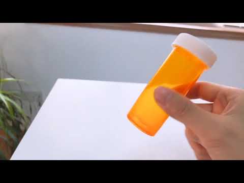 Child resistant cap vial