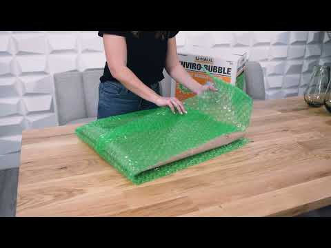 Part of a video titled How to Cover Furniture for Moving Using Paper Pads - YouTube