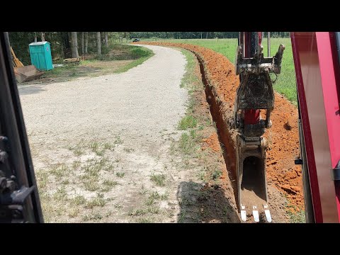 Digging 1700' Of Power Line To The Cabin Fighting Groundwater!
