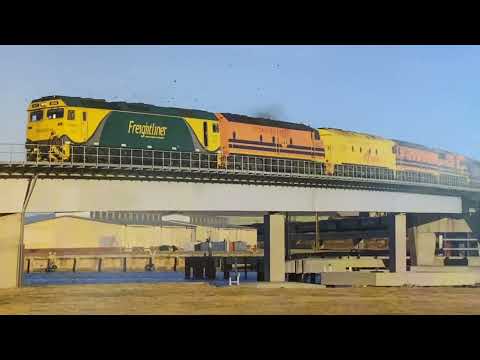 G533, CLF6, ALF23, ALF18, and V544 cross the Mary McKillop rail bridge