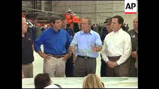 Bush tours hurricane-hit region, aerials