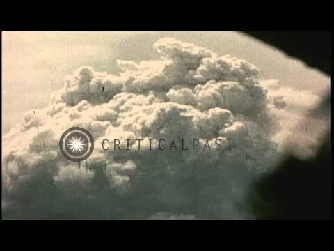 Bombs explode on a target area and a B-29 Superfortress lands on a field in the P...HD Stock Footage