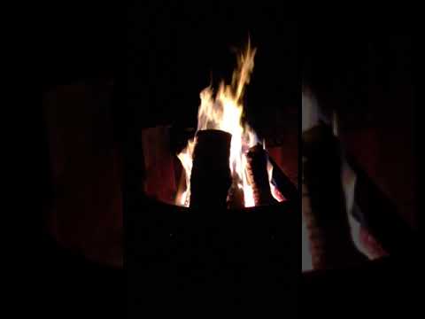 Sitting by the campfire enjoying a relaxing evening at Beaver Valley Campgrounds.