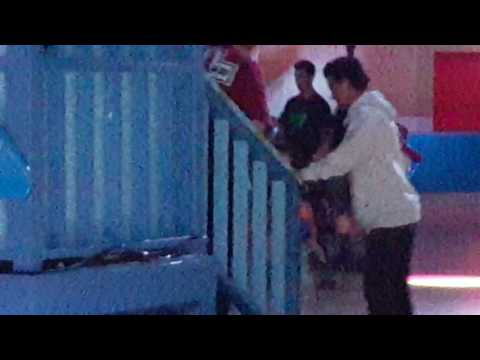 Skinny legs on roller skates.