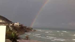 preview picture of video 'Rainbow over Agios Stefanos Beach.'