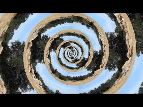 Droste Effect Running in a Fractal Spiral