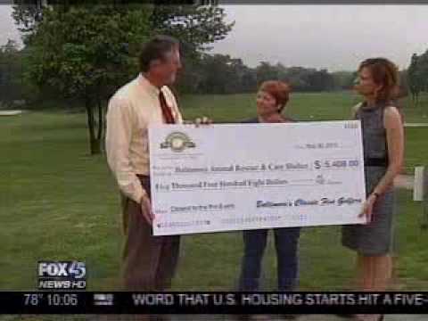 Classic 5 Golf presents check to BARCS