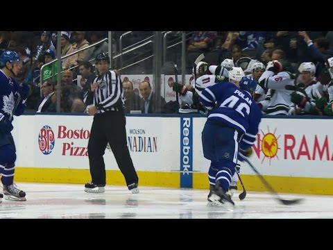 Linesman Miller takes Polak slap shot off knee