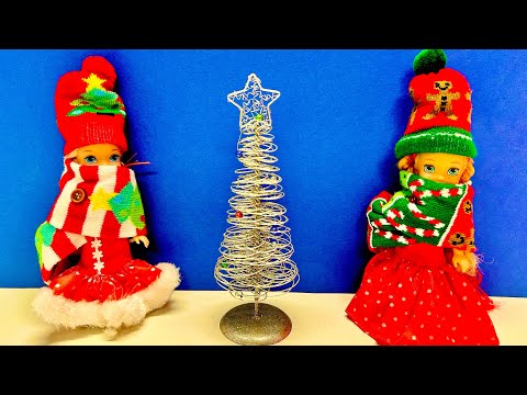 Elsa and Anna toddlers decorate the Christmas tree