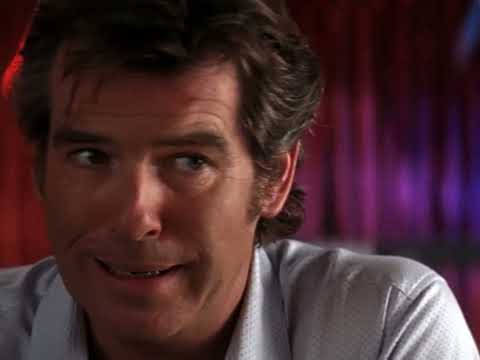 Laws of Attraction (2004) official trailer still with Julianne Moore and Pierce Brosnan in a courtroom