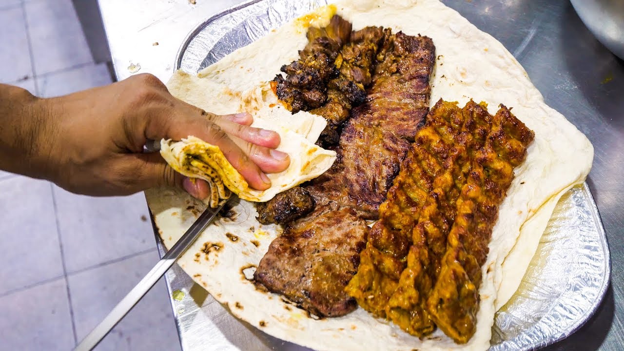 A traveler immerses in street food tour at Deira.