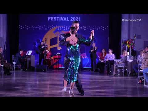  Maxim Luchko  and  Natalia Luchko  are  dancing  to  a  tango  by  Solo Tango Orquesta  at  La Boca Tango Festival  in  2021