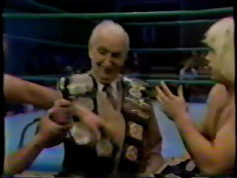 Buddy Rose and The Sheepherders (Butch Miller and Luke Williams) have all the belts