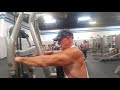 Coach Bill is showing how we do rear shoulder pec deck machine