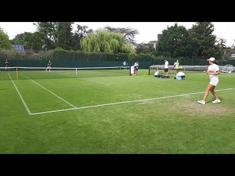 Iga Swiatek- A. Pavliuchénkova practicing at wimbledon 2021