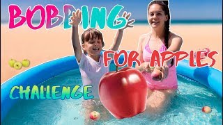 BOBBING FOR APPLES CHALLENGE in the pool