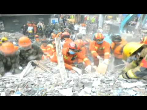 В Китае обрушились четыре многоэтажных дома, 20 человек погибли (видео)