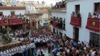 preview picture of video 'Periana  procesión  fiestas San Isidro Labrador 2012 ofrenda de flores y  trompetas'