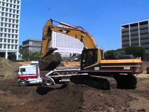 Totally Trucks - A Lotta Dirt for A Lotta Excavator.