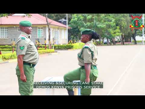 RECEIVING AND SECURING CANE STAKE DEMOS BY  KENYA PRISONS INTRUCTORS