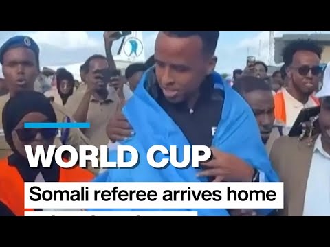 Somali World Cup referee denied entry to US arrives home to hero's welcome