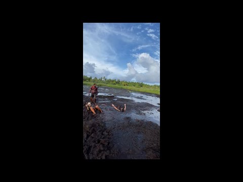 Guy Jumped in to a Mud Lake, Next to His Friends, Then Fully Sank Under