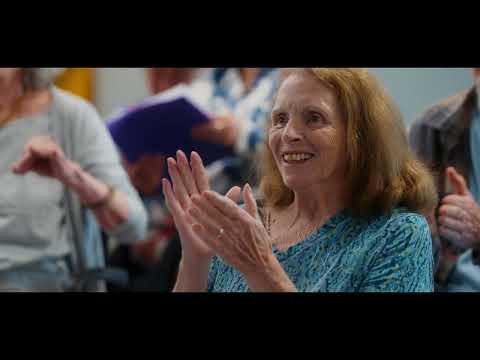 What is AGE's Thrive Social & Wellness Center?