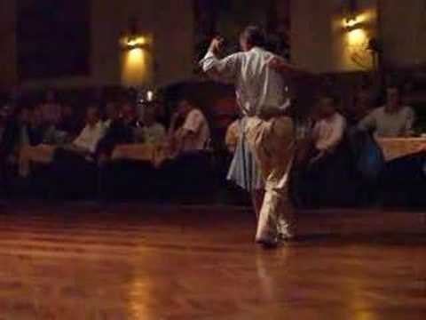  Coca Cartery  and  Osvaldo Cartery  are  dancing  to  a  tango