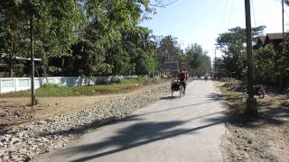 preview picture of video 'Manual road construction, walking into village, Ngapali, Burma, 2015-01-23'