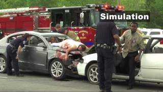 Staged car crash shows drunk driving dangers