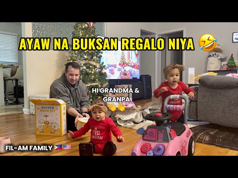 UNWRAPPING CHRISTMAS PRESENTS + HER FIRST CHRISTMAS 