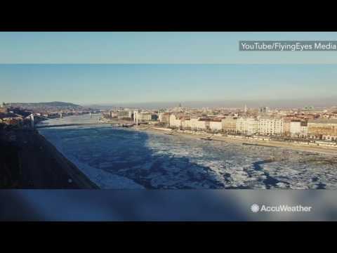 Spectacular drone footage shows ice sheets flowing down Danube river
