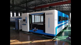 enclosed exchange platform 8kw 12kw cnc fiber laser cutting machine for metal cutting