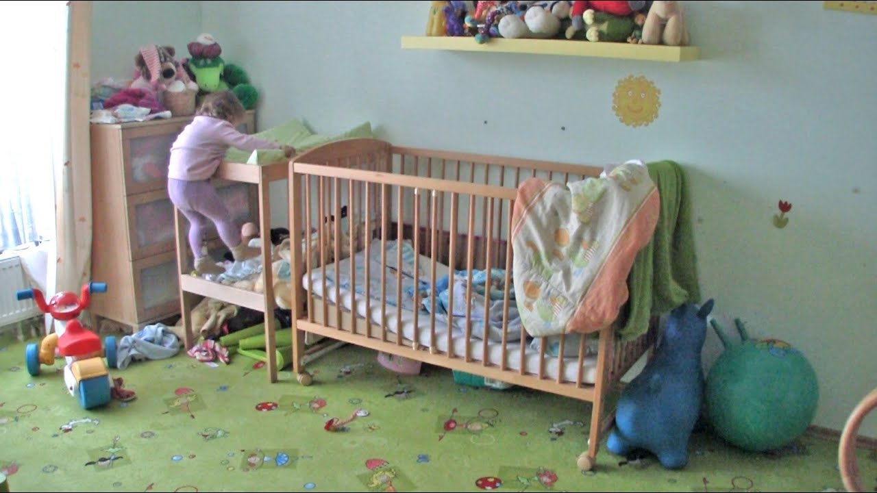 Teri escaping from the crib (17 months old)