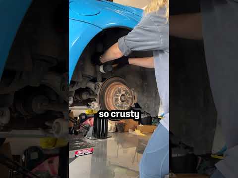 Installing Coilovers and Toe Arms On My 350Z!!!