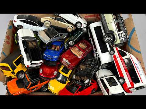 ŠKATLA POLNA LITIH AVTOMOBILOV - Toyota, Rolls Royce, Tesla, Porsche, Ford, kombi, rešilec