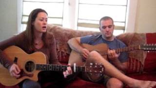 Melissa Mesko and Brian Mesko perfroming in the aeroplane over the sea - cover