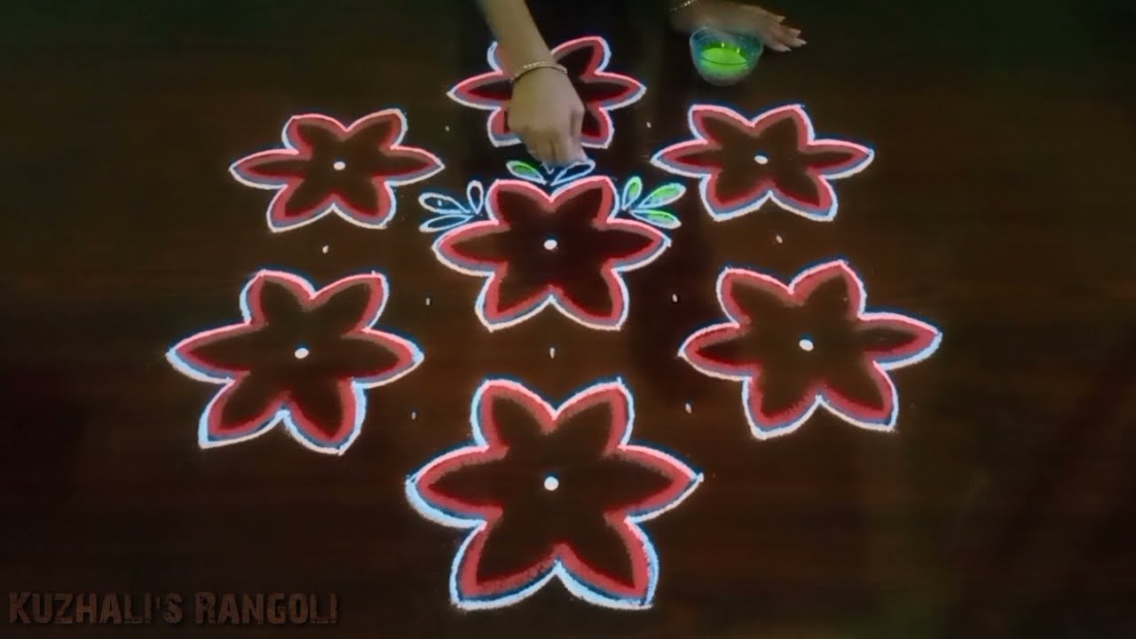 simple 11 dot kolam design by kuzhali rangoli