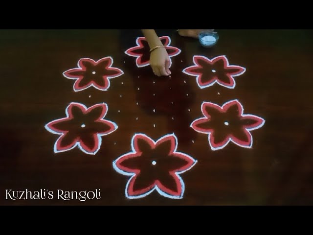Simple 11 dot kolam design by kuzhali rangoli