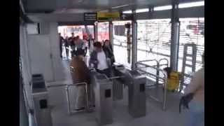 Man Trips Rude Woman at Train Station