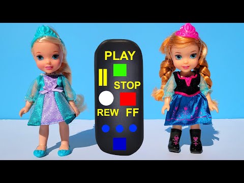 Elsa & Anna toddlers playing jokes with a remote control