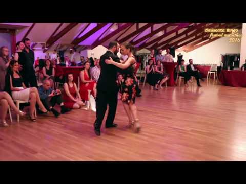  Endre Szeghalmi  and  Andrea Serban  are  dancing  to  the  tango  "  Tus Labios Me Diran  "  by  Carlos di Sarli  at  Timisoara Tango Festival