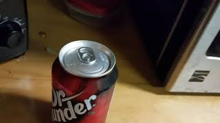 how to open a can of soda without making noises