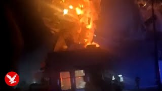 Explosion tears roof off Domino’s Pizza after car crashes into restaurant