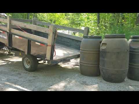 Sure Trac Dump Trailer  Easy way to move 700 pounds of feed by yourself
