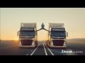 Van Damme does splits between moving tru